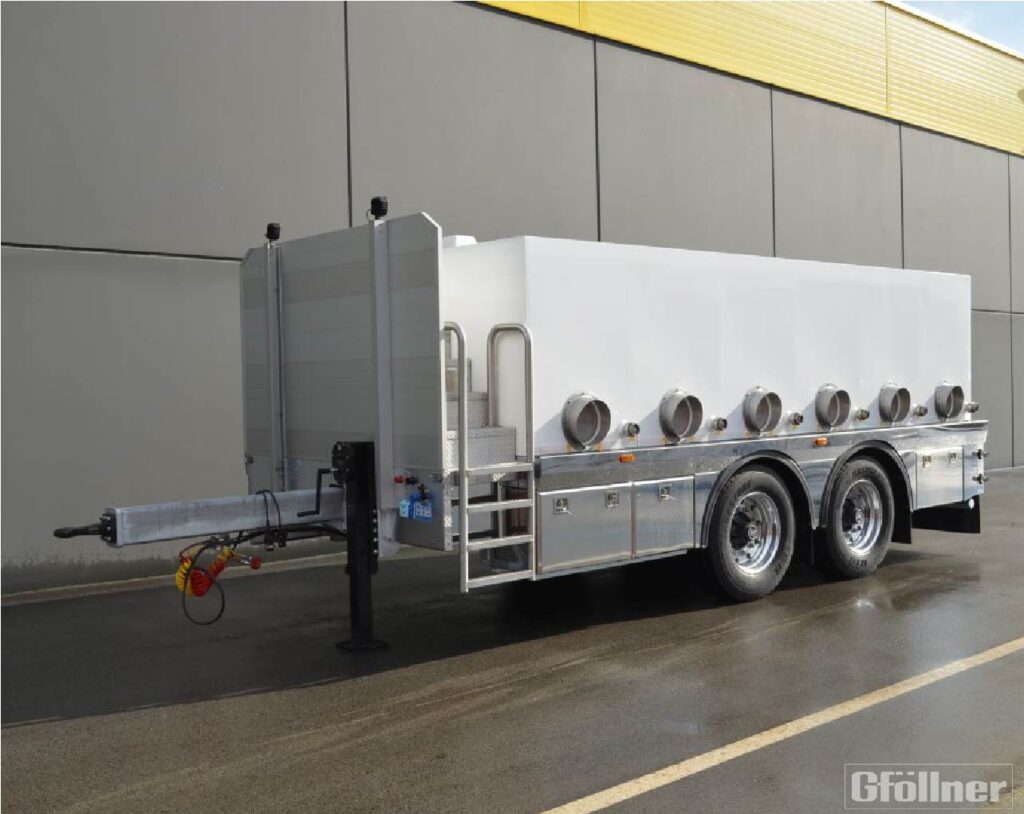 Tandem trailer chassis to support a plastic tank